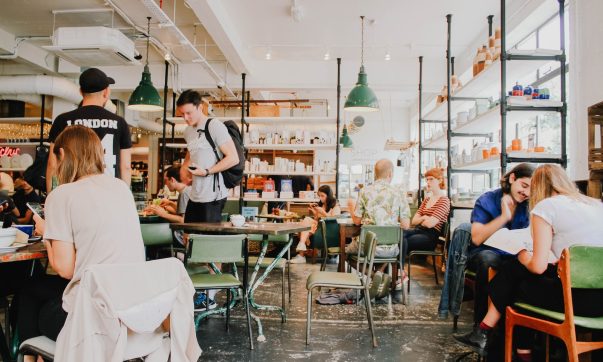 people eating inside of cafeteria during daytime