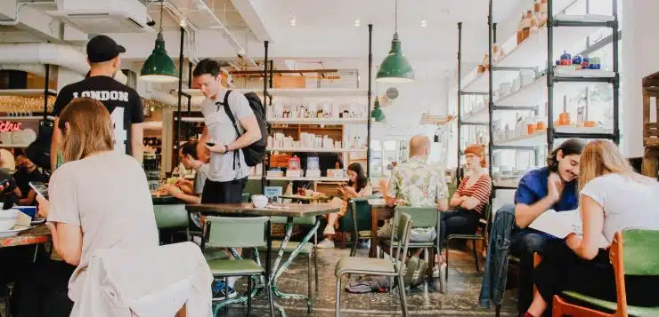 people eating inside of cafeteria during daytime